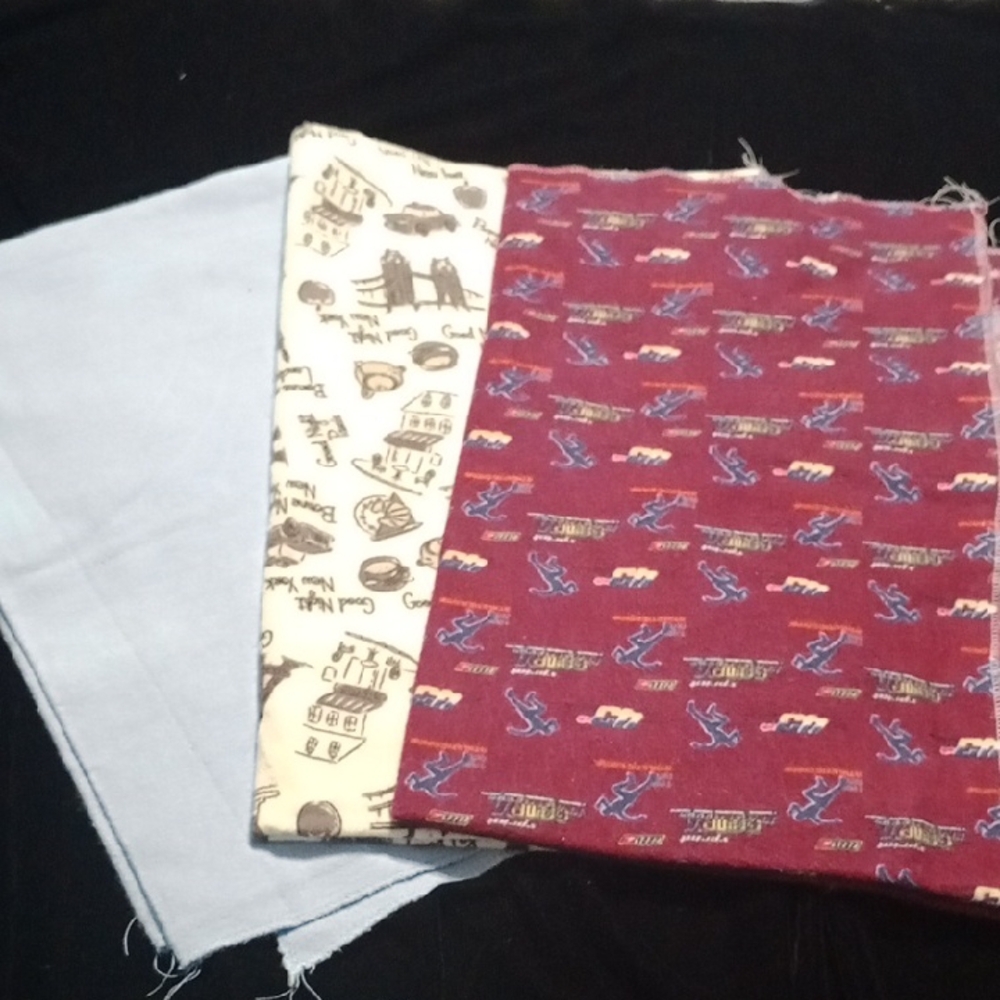 Trio of Patterned Fabric Pieces in Red, Cream, and Light Blue